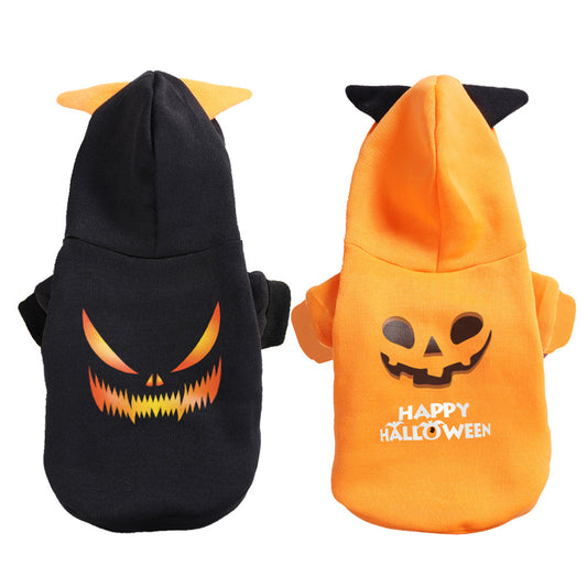 Two Halloween-themed pet costumes, one black with a jack-o'-lantern face and the other orange with 'Happy Halloween' text.
