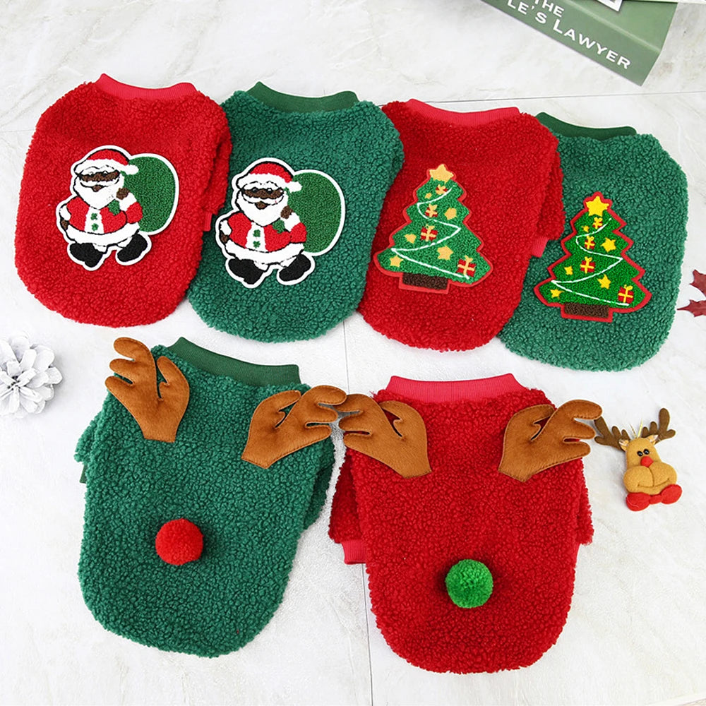 Set of Christmas-themed dog sweaters with Santa Claus, trees, and reindeer designs on a white background.