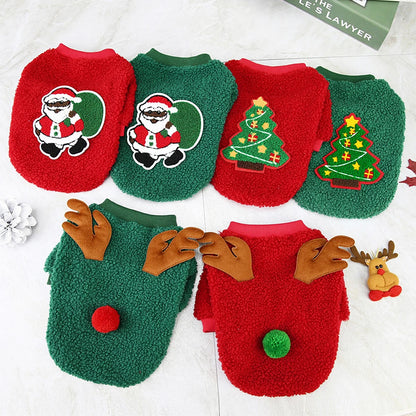 Set of Christmas-themed dog sweaters with Santa Claus, trees, and reindeer designs on a white background.