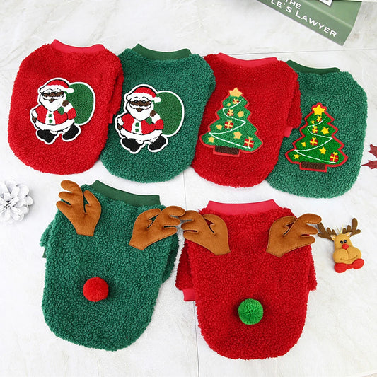 Set of Christmas-themed dog sweaters with Santa Claus, trees, and reindeer designs on a white background.
